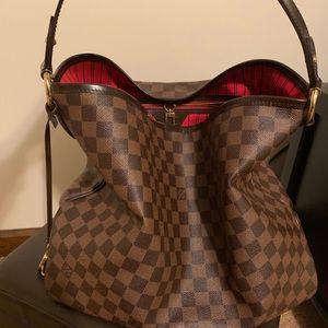 Louis vuitton delightful.  Box & sleeper included